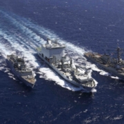 Combat Support Ship Asterix (centre) resupplies US destroyer USS Truxtun and Canadian frigate HMCS Montreal during evacuation efforts offshore Sudan during May 2023. (US Department of Defense)