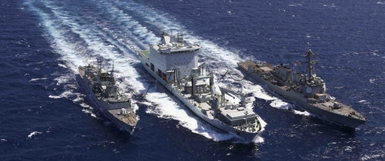 Combat Support Ship Asterix (centre) resupplies US destroyer USS Truxtun and Canadian frigate HMCS Montreal during evacuation efforts offshore Sudan during May 2023. (US Department of Defense)