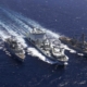 Combat Support Ship Asterix (centre) resupplies US destroyer USS Truxtun and Canadian frigate HMCS Montreal during evacuation efforts offshore Sudan during May 2023. (US Department of Defense)